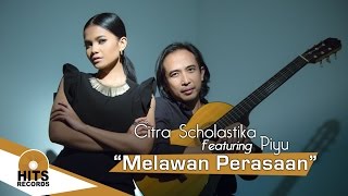 Watch Citra Scholastika Feat Piyu - Melawan perasaan (Official Music Video) Video