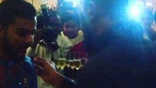 Watch Virat Kohli Cools Off With Champagne After Tormenting Australia in World T20 Sports News Video Video