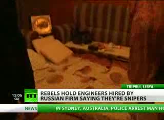 Watch 'Gaddafi sniper' Russian cooks locked up by Libya rebels Video