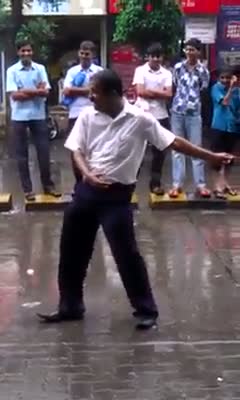 Watch Amazing Dance In The middle of the Road Video