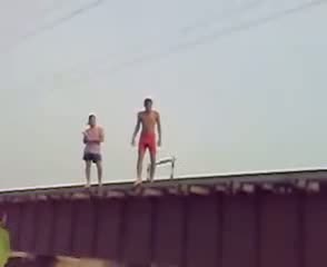 Watch Crazy Indians almost hit by a train - MUST SEE!! Video