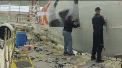 Watch FedEx Panda Express Decal Applied to Boeing 777F Video