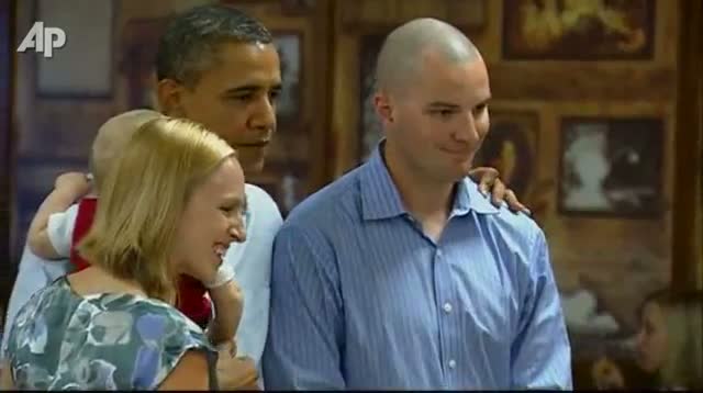 Watch Baby Sticks Fingers in Obamas Mouth Video