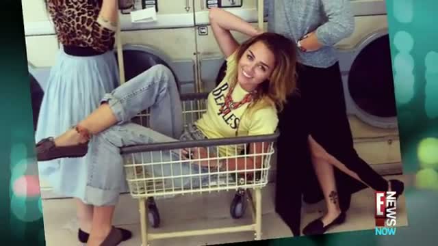 Watch Miley Cyrus Strikes a $exy Pose Video