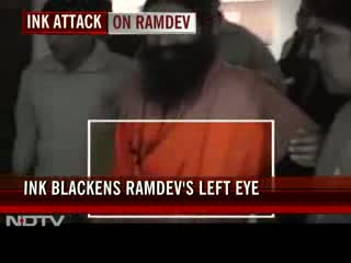 Watch Man throws black ink at Baba Ramdev in Delhi Video