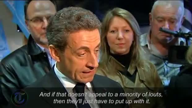 Watch Nicolas Sarkozy penned into bar after being heckled on France presidential election campaign Video