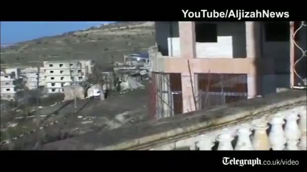 Watch Syrian rebels use IED to attack government tank in Idlib Video