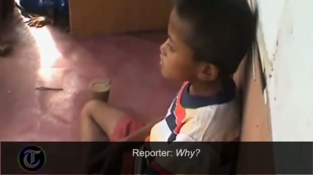 Watch 8 year old Boy Smokes Two Packs of Cigarettes a day video Video
