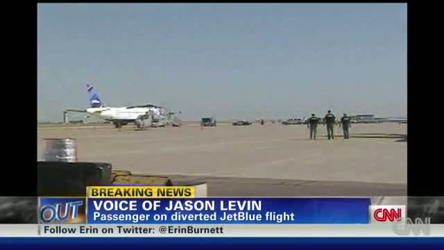Watch JetBlue Pilot "Flips Out", Subdued by Passengers Video