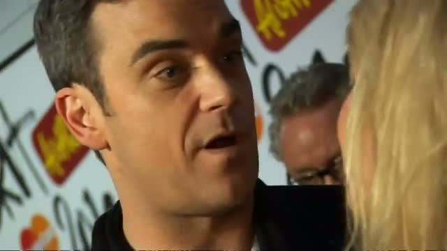 Watch Robbie Williams announces he's going to be a dad video Video