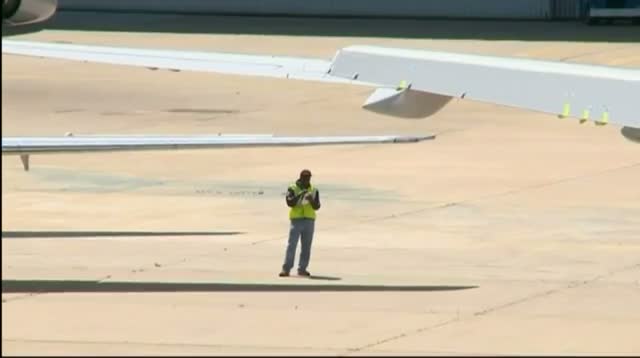 Watch Raw Video - American Inspects Planes After Storm video Video