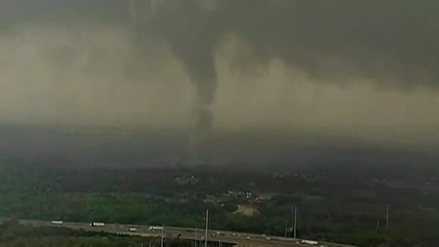 Watch Dramatic Pictures - Tornado tears through Texas causing chaos in Dallas video Video