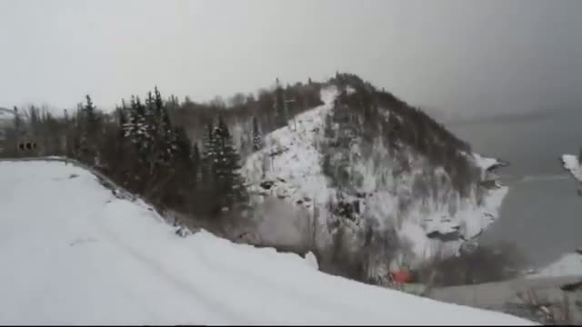 Watch Lucky escape for driver as lorry falls down cliff in Norway video Video