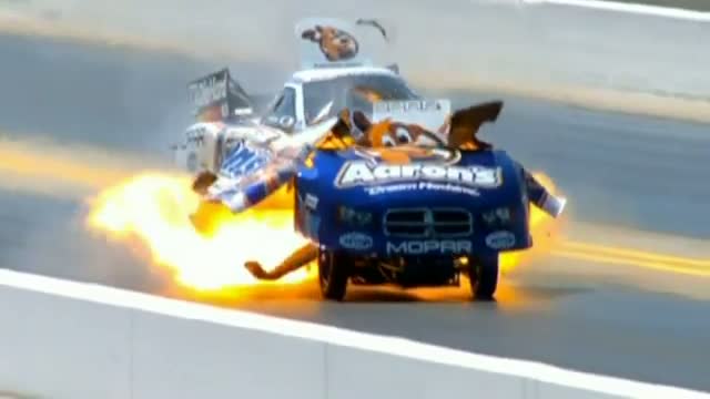 Watch Dramatic footage as Matt Hagan's drag car explodes during race Video