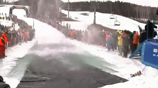 Watch Daredevils try to ski over ice cold puddle in Russia Video
