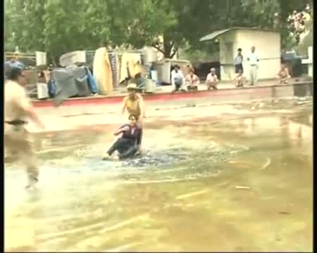 Watch Woman attempts suicide near Parliament Video