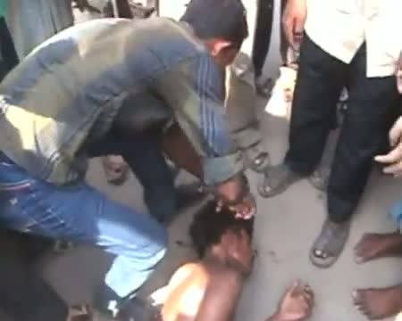 Watch Humans turn animal Brutally beat up a thief Video