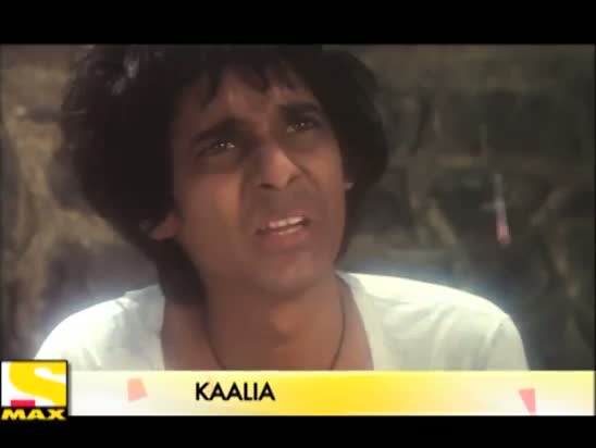 Watch Kaalia: Amitabh Bachchan Bribes The Shoe Polishwala To Get The Information Video