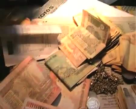 Watch Rupee touches record low, breaches 55 mark vs US dollar Video