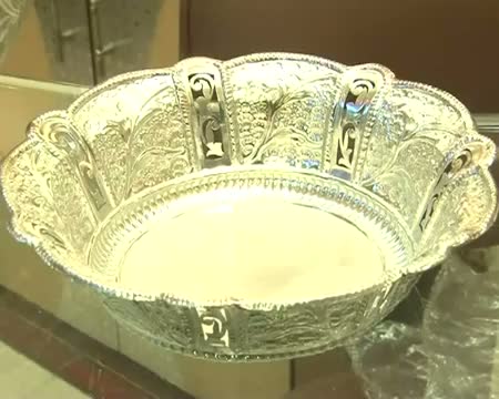 Watch Gold down by Rs 10; silver by Rs 200 on sluggish demand Video