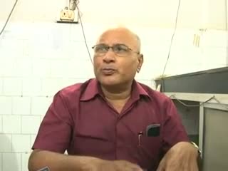 Watch Husband hits wife with axe for dowry Video