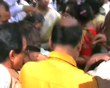Watch Woman catches fire during protest Video