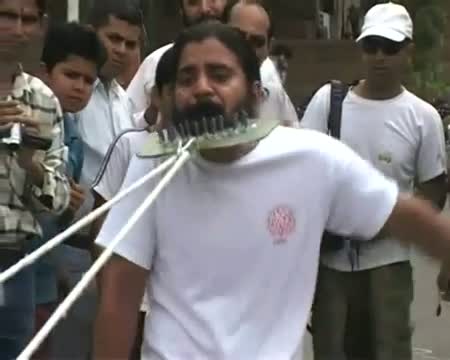 Watch Man pulls car with beard and moustache Video