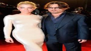 Watch Things are 'Heating Up' for Johnny Depp & Amber Heard following Paradis Split Video