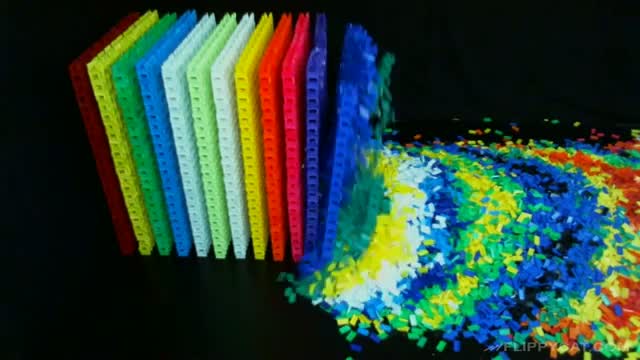Watch EXTRAS - 60,000 Dominos (Personal Record) Video