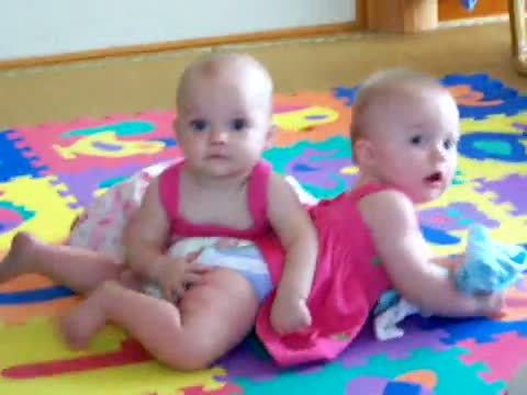 Watch Twins Baby Playing Video