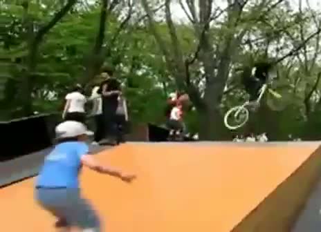 Watch BMX rider takes out rollerblader Video