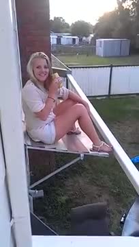 Watch Drunk chick falls through awning Video