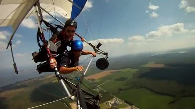 Watch Guy throws up while hang gliding at 2,000 feet Video