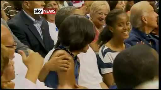 Watch Michelle And Barack Obama Kiss At Basketball Game video Video