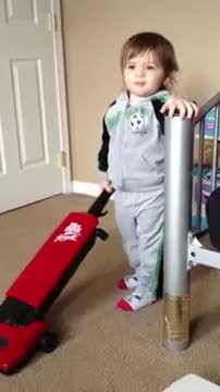 Watch Girl's funny way of saying "vacuum" Video