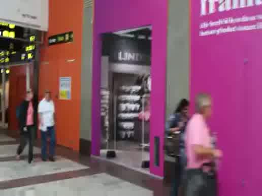 Watch Dude walks into picture of a store Video