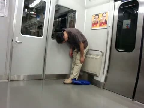Watch Guy falls asleep while standing on Tokyo train Video