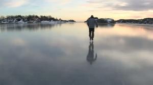 Watch Crazy guy skates on thin ice Video