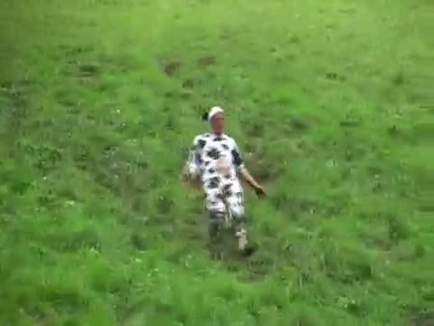 Watch Hilariously dangerous downhill cheese rolling Video