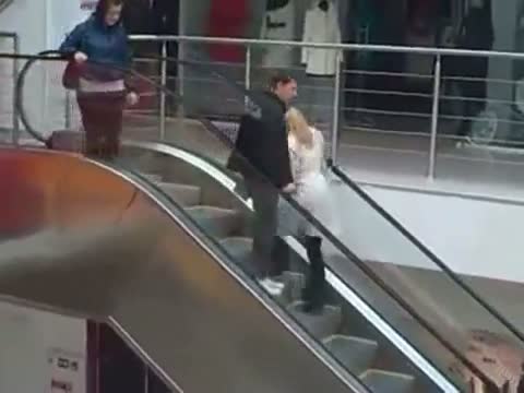 Watch Blonde Escalator Fail Video