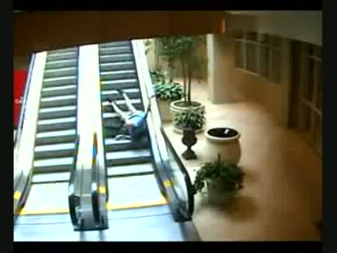 Watch Old man falls down on escalator Video