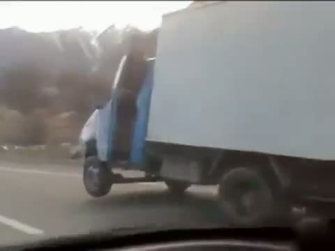 Watch Truck Driving On Three Wheels Video