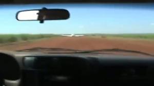 Watch Brazilian marshals crash car into plane Video