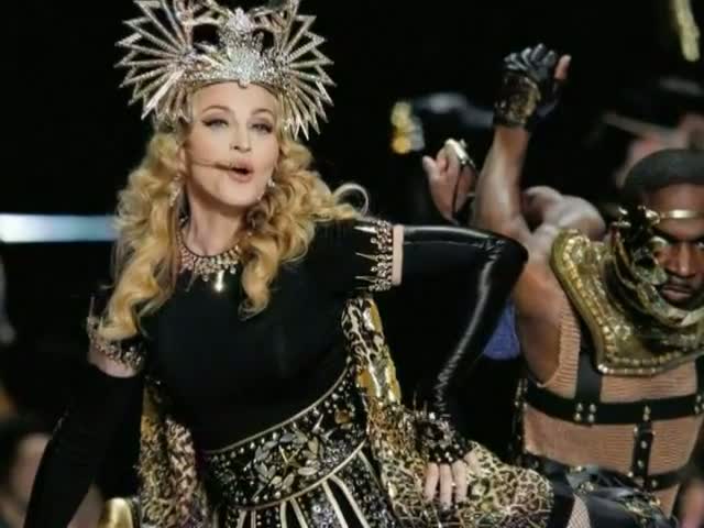 Watch Madonna has "forgiven" Sir Elton John for calling her a "fairground stripper" Video