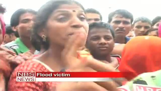 Watch Police manhandles flood victims Video