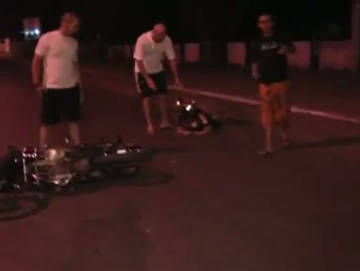 Watch Guy Crashes Motorcycle In Front of Reporter Video