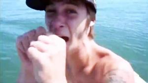 Watch Scared Guys Watch A Hammerhead Eat Another Shark Video