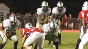 Watch High School Quarterback Hits Ref In Head With Football Video