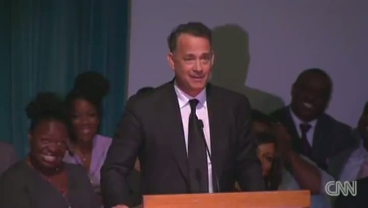 Watch Tom Hanks Cracks Up Memorial Service Video