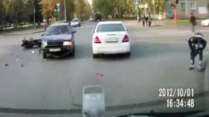 Watch Guy on Motorcycle Lands on Feet After Collision Video